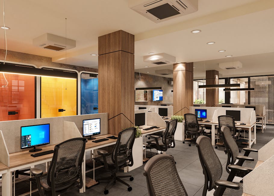 Bright and spacious modern open office interior with workstations and colorful elements