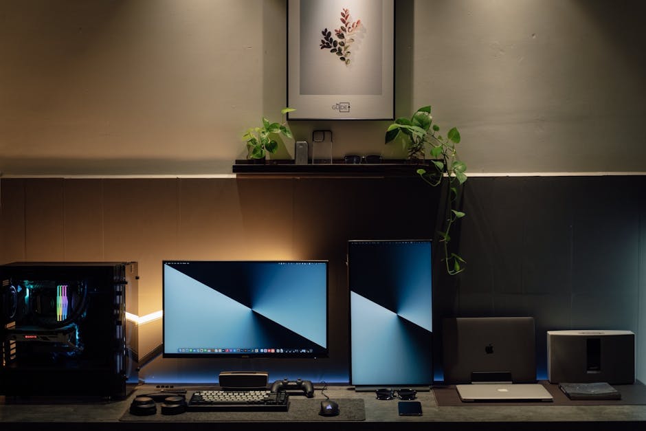 A sleek home office setup with dual monitors, potted plants, and tech gadgets in a modern interior